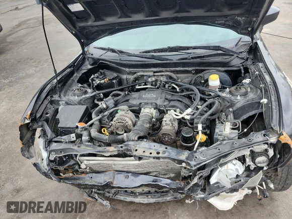 2015 Scion FR-S z VIN JF1ZNAA12F8711821, wystawiony jako Copart lot #59886505 z przebiegiem 115 796 mil mil oraz Szkoda całkowita • Salvage title. Historia ofert i sprzedaży dostępna na DreamBid. Obrazek 11.