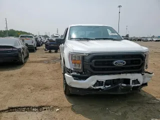 2023 Ford F-150 XL with VIN 1FTEW1EP7PFB66555, listed as a Copart auction lot 59384665 with 28,495 mi miles and Salvage title. Bid and sale history available at DreamBid. Image 13.