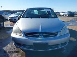 2006 Mitsubishi Lancer ES with VIN JA3AJ26E06U057959, listed as a IAAI auction lot 41347649 with 122,963 mi miles. Bid and sale history available at carsss.com. Image 13.