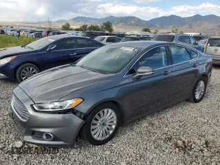 2013 Ford Fusion SE Hybrid с VIN 3FA6P0LU5DR222825, выставлен на аукционе Copart как лот 65801505 с пробегом 154 591 миль миль и Списание • Salvage title. История ставок и продаж доступна на DreamBid. Изображение 1.