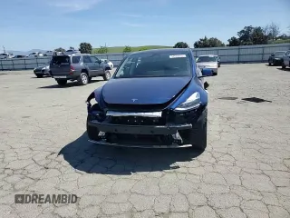 2024 Tesla Model Y Long Range z VIN 7SAYGAEE3RF034699, wystawiony jako Copart lot #54523815 z przebiegiem 9 764 mil mil oraz Szkoda całkowita • Salvage title. Historia ofert i sprzedaży dostępna na DreamBid. Obrazek 14.