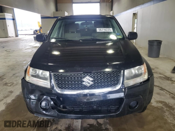 2009 Suzuki Grand Vitara with VIN JS3TE042694100010, listed as a Copart auction lot 56716225 with 148,495 mi miles and Salvage title. Bid and sale history available at DreamBid. Image 5.
