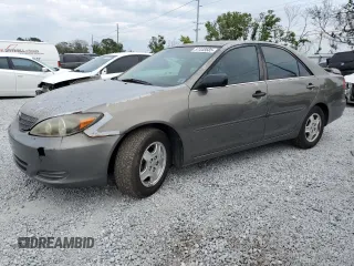 2002 Toyota Camry XLE z VIN 4T1BF32K02U529267, wystawiony jako Copart lot #57448585 z przebiegiem 232 240 mil mil oraz Czysty tytuł • Clean title. Historia ofert i sprzedaży dostępna na DreamBid. Obrazek 1.
