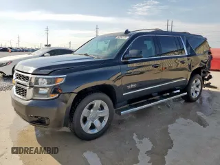 2019 Chevrolet Suburban LT with VIN 1GNSCHKC5KR296872, listed as a Copart auction lot 50264235 with 150,329 mi miles and Salvage Title. Bid and sale history available at DreamBid. Image 1.