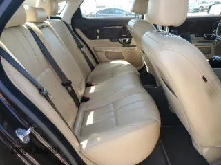 2014 Jaguar XJ with VIN SAJWA1CZ3E8V69877, listed as a Copart auction lot 51520405 with 57,567 mi miles and Clean Title. Bid and sale history available at DreamBid. Image 10.