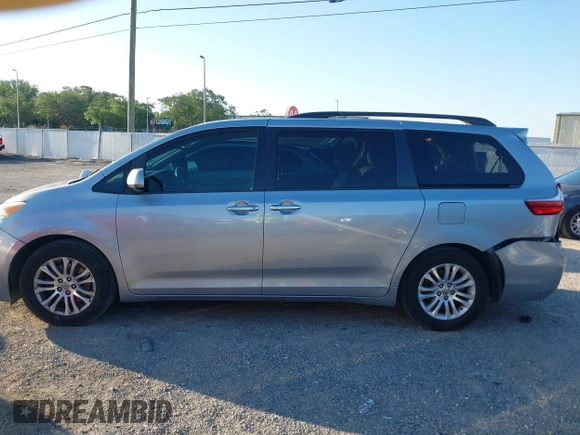 2015 Toyota Sienna XLE with VIN 5TDYK3DC9FS610925, listed as a IAAI auction lot 42022267 with 153,997 mi miles. Bid and sale history available at carsss.com. Image 14.