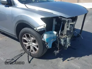 2011 Mazda CX-9 Sport with VIN JM3TB2BVXB0307360, listed as a IAAI auction lot 42580629 with 136,928 mi miles and . Bid and sale history available at DreamBid. Image 19.