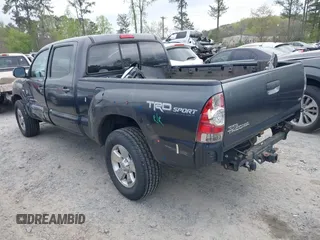 2015 Toyota Tacoma with VIN 3TMMU4FNXFM073978, listed as a IAAI auction lot 41935264 with 132,806 mi miles and . Bid and sale history available at DreamBid. Image 3.