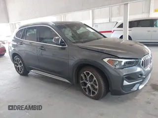 2022 BMW X1 sDrive28i z VIN WBXJG7C0XN5U57142, wystawiony jako IAAI lot #42265185 z przebiegiem 29 986 mil mil oraz . Historia ofert i sprzedaży dostępna na DreamBid. Obrazek 1.