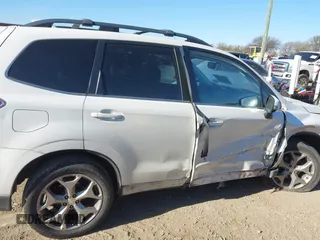 2016 Subaru Forester 2.5i Touring with VIN JF2SJAVC7GH404943, listed as a IAAI auction lot 41246088 with 157,913 mi miles. Bid and sale history available at carsss.com. Image 14.
