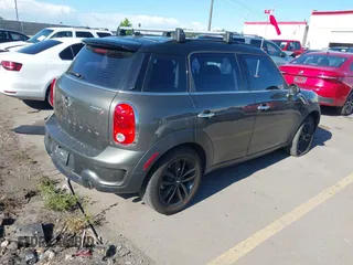 2014 MINI Countryman S z VIN WMWZC3C59EWP29686, wystawiony jako IAAI lot #42292047 z przebiegiem 93 139 mil mil oraz . Historia ofert i sprzedaży dostępna na DreamBid. Obrazek 4.