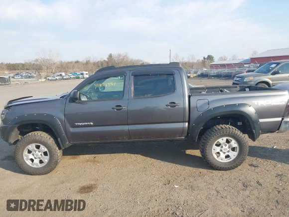 2014 Toyota Tacoma with VIN 3TMLU4EN3EM151545, listed as a IAAI auction lot 41821451 with 261,311 mi miles. Bid and sale history available at carsss.com. Image 15.