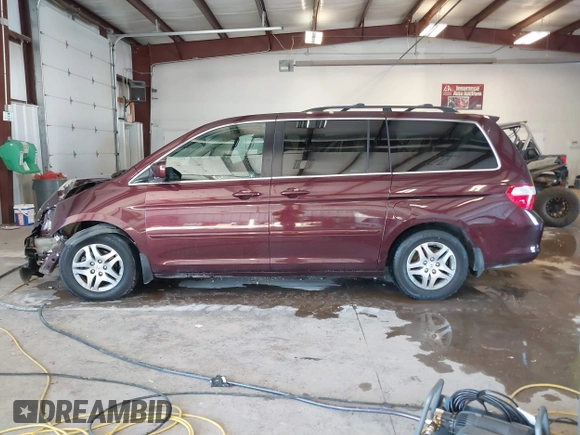2007 Honda Odyssey EX-L with VIN 5FNRL38727B066885, listed as a IAAI auction lot 41317374 with 220,243 mi miles. Bid and sale history available at carsss.com. Image 14.