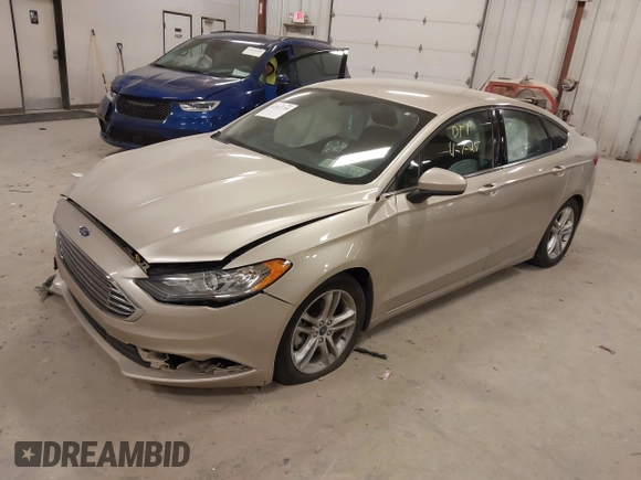 2018 Ford Fusion SE z VIN 3FA6P0HD2JR201693, wystawiony jako IAAI lot #42012709 z przebiegiem 110 857 mil mil oraz . Historia ofert i sprzedaży dostępna na DreamBid. Obrazek 2.