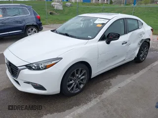 2018 Mazda 3 Touring with VIN 3MZBN1V32JM190611, listed as a IAAI auction lot 42032844 with 63,493 mi miles and . Bid and sale history available at DreamBid. Image 18.