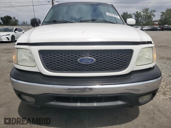 2002 Ford F-150 XLT with VIN 1FTRW07L52KA04929, listed as a Copart auction lot 54491815 with 169,132 mi miles and Salvage Title. Bid and sale history available at carsss.com. Image 5.