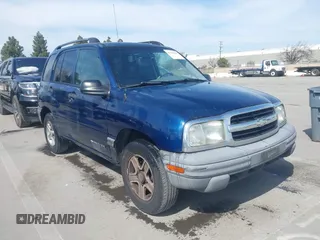 2003 Chevrolet Tracker z VIN 2CNBE13C836923761, wystawiony jako IAAI lot #41762049 z przebiegiem 145 533 mil mil oraz . Historia ofert i sprzedaży dostępna na DreamBid. Obrazek 1.