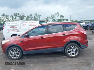 2015 Ford Escape Titanium z VIN 1FMCU0J99FUA92432, wystawiony jako IAAI lot #42257036 z przebiegiem 127 632 mil mil oraz . Historia ofert i sprzedaży dostępna na DreamBid. Obrazek 14.