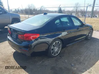 2019 BMW 5 Series M550i xDrive with VIN WBAJB9C51KB464879, listed as a IAAI auction lot 41774834 with 77,379 mi miles and . Bid and sale history available at DreamBid. Image 4.