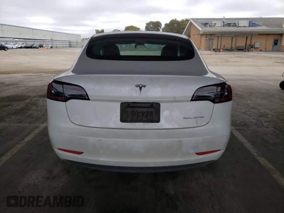 2022 Tesla Model 3 Long Range with VIN 5YJ3E1EB2NF267485, listed as a Copart auction lot 54952505 with 30,569 mi miles and Clean Title. Bid and sale history available at DreamBid. Image 6.