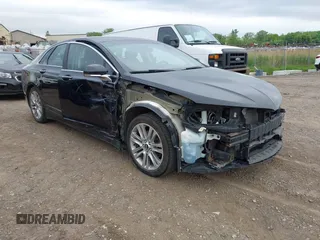 2016 Lincoln MKZ z VIN 3LN6L2G99GR601799, wystawiony jako IAAI lot #42350755 z przebiegiem 106 144 mil mil oraz . Historia ofert i sprzedaży dostępna na DreamBid. Obrazek 1.