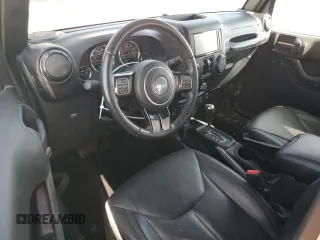 2017 Jeep Wrangler Unlimited Sahara z VIN 1C4BJWEG3HL674913, wystawiony jako Copart lot #73943574 z przebiegiem 46 793 mil mil oraz Szkoda całkowita • Salvage title. Historia ofert i sprzedaży dostępna na DreamBid. Obrazek 8.
