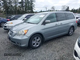 2008 Honda Odyssey Touring with VIN 5FNRL38908B098771, listed as a IAAI auction lot 41878646 with 167,834 mi miles. Bid and sale history available at carsss.com. Image 2.
