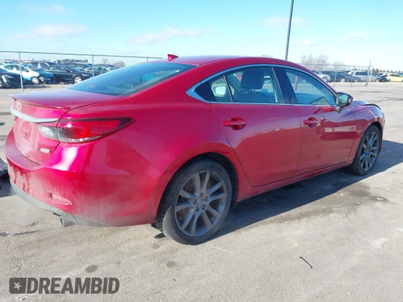 2016 Mazda 6 i Grand Touring with VIN JM1GJ1W51G1443203, listed as a IAAI auction lot 41247354 with 144,840 mi miles. Bid and sale history available at carsss.com. Image 4.