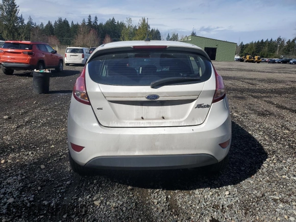 2018 Ford Fiesta SE with VIN 3FADP4EJ1JM128130, listed as a Copart auction lot 50574285 with 141,002 mi miles and Salvage Title. Bid and sale history available at DreamBid. Image 6.