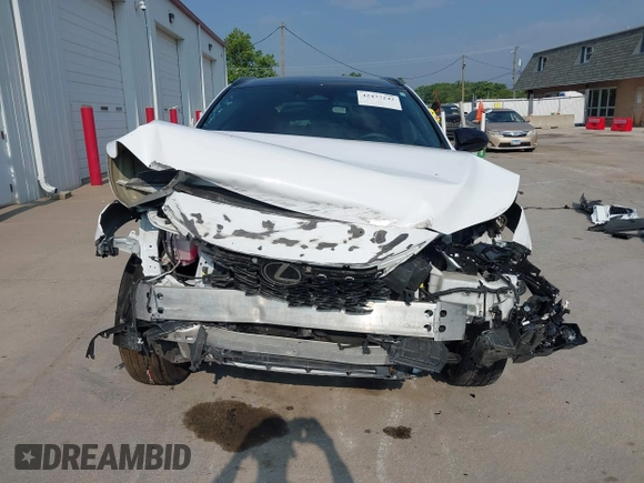 2023 Lexus RX 500h F Sport Performance z VIN 2T2BCMEA2PC001025, wystawiony jako IAAI lot #42477242 z przebiegiem 21 722 mil mil oraz . Historia ofert i sprzedaży dostępna na DreamBid. Obrazek 13.