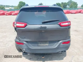 2016 Jeep Cherokee Latitude with VIN 1C4PJMCBXGW122274, listed as a IAAI auction lot 42407175 with 152,229 mi miles and . Bid and sale history available at DreamBid. Image 16.