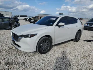 2024 Mazda CX-5 2.5 Turbo Signature with VIN JM3KFBXY7R0518304, listed as a Copart auction lot 42788985 with 8,593 mi miles and Salvage Title. Bid and sale history available at carsss.com. Image 1.