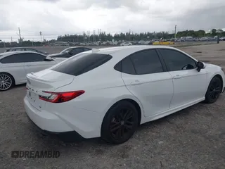 2025 Toyota Camry LE with VIN 4T1DAACK6SU531129, listed as a IAAI auction lot 41969220 with 10,542 mi miles and . Bid and sale history available at DreamBid. Image 4.