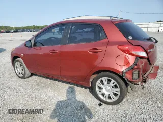 2014 Mazda 2 Sport with VIN JM1DE1KY8E0171646, listed as a Copart auction lot 70670884 with 98,656 mi miles and Salvage Title. Bid and sale history available at carsss.com. Image 2.