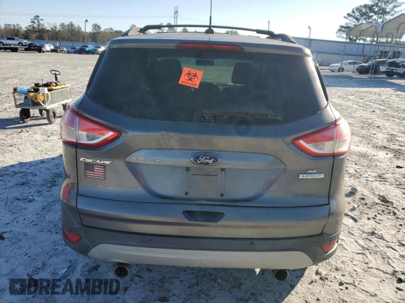 2013 Ford Escape SE with VIN 1FMCU0GX1DUB10439, listed as a Copart auction lot 49320845 with 145,614 mi miles and Clean title. Bid and sale history available at DreamBid. Image 6.