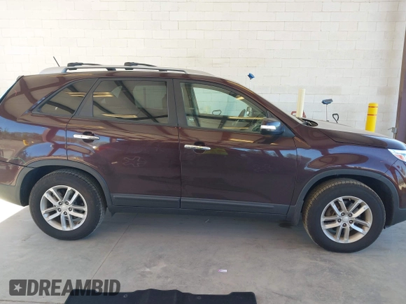 2014 Kia Sorento LX with VIN 5XYKT4A61EG435606, listed as a IAAI auction lot 42075423 with 112,474 mi miles and . Bid and sale history available at DreamBid. Image 13.