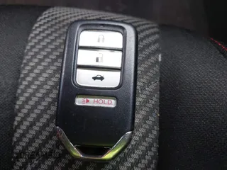 2017 Honda Civic Sedan Si with VIN 2HGFC1E54HH701127, listed as a IAAI auction lot 41845336 with 140,150 mi miles. Bid and sale history available at carsss.com. Image 11.