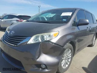 2012 Toyota Sienna XLE AAS with VIN 5TDYK3DC4CS216695, listed as a IAAI auction lot 41731768 with 186,362 mi miles. Bid and sale history available at carsss.com. Image 6.