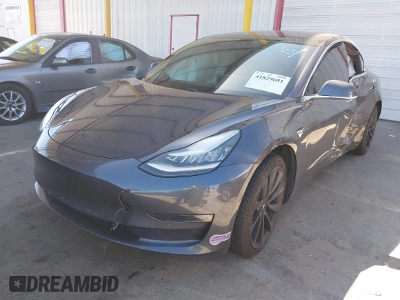 2018 Tesla Model 3 Long Range Battery with VIN 5YJ3E1EA7JF163401, listed as a IAAI auction lot 41829681 with 90,065 mi miles. Bid and sale history available at carsss.com. Image 16.