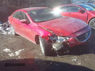 2015 Mazda 6 i Touring with VIN JM1GJ1V55F1182626, listed as a IAAI auction lot 41419663 with 145,239 mi miles. Bid and sale history available at carsss.com. Image 1.