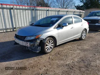 2012 Honda Civic EX-L with VIN 19XFB2F99CE047996, listed as a IAAI auction lot 41596688 with 124,523 mi miles and . Bid and sale history available at DreamBid. Image 2.