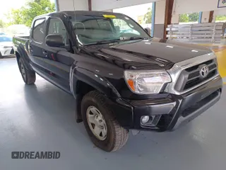 2014 Toyota Tacoma with VIN 3TMMU4FN8EM068633, listed as a IAAI auction lot 42727713 with 185,402 mi miles and . Bid and sale history available at DreamBid. Image 10.