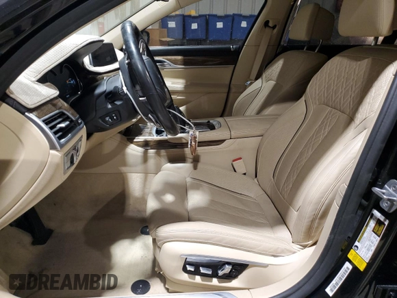 2017 BMW 7 Series 740i with VIN WBA7E2C3XHG741046, listed as a Copart auction lot 45382705 with 99,065 mi miles and Salvage Title. Bid and sale history available at carsss.com. Image 7.