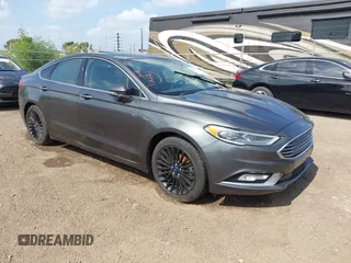 2018 Ford Fusion Titanium with VIN 3FA6P0D98JR188532, listed as a IAAI auction lot 41928452 with Not provided miles and . Bid and sale history available at DreamBid. Image 1.