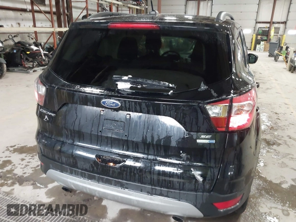 2018 Ford Escape SE with VIN 1FMCU9GD7JUD36295, listed as a IAAI auction lot 41855037 with 85,305 mi miles. Bid and sale history available at carsss.com. Image 16.