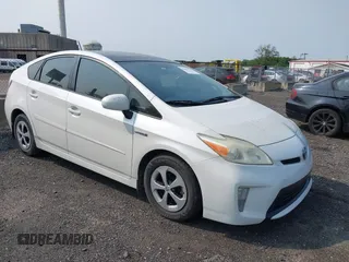 2013 Toyota Prius One z VIN JTDKN3DUXD5553157, wystawiony jako IAAI lot #42409329 z przebiegiem 192 895 mil mil oraz . Historia ofert i sprzedaży dostępna na DreamBid. Obrazek 1.