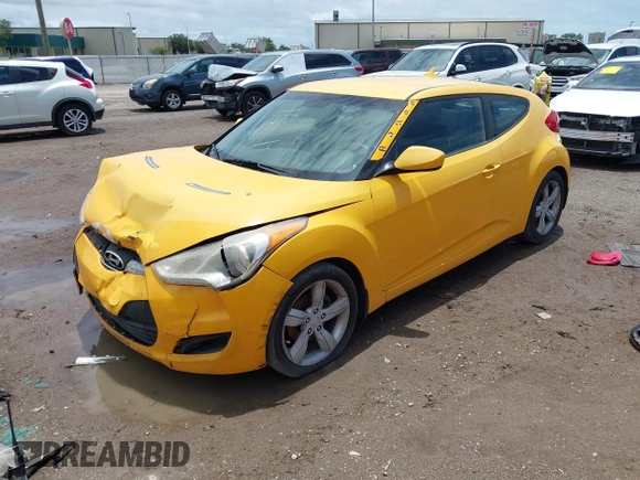 2012 Hyundai Veloster w/Black Int with VIN KMHTC6AD5CU046702, listed as a IAAI auction lot 42245379 with 136,327 mi miles and . Bid and sale history available at DreamBid. Image 17.