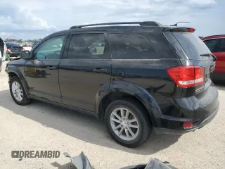 2015 Dodge Journey SXT with VIN 3C4PDDBG4FT548972, listed as a Copart auction lot 74633934 with 93,944 mi miles and Salvage Title. Bid and sale history available at DreamBid. Image 2.