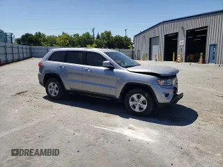 2016 Jeep Grand Cherokee Laredo with VIN 1C4RJEAGXGC358910, listed as a Copart auction lot 61499455 with 86,054 mi miles and Salvage title. Bid and sale history available at DreamBid. Image 13.