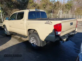 2017 Toyota Tacoma SR5 with VIN 3TMCZ5ANXHM088347, listed as a IAAI auction lot 41591318 with 103,800 mi miles and . Bid and sale history available at DreamBid. Image 3.